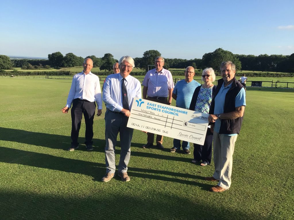 Mr George Fargher, Chairman and members of the ESSC presenting the cheque for £1,000 to WCC Secretary Dave Shooter which was put towards the purchase of a club mower.